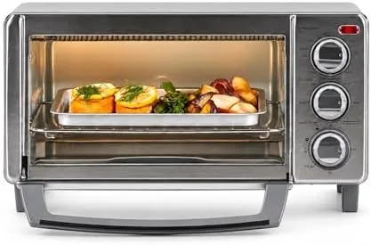 Front view of the stainless steel BLACK+DECKER 4 slice toaster oven showing the controls