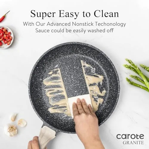 The CAROTE skillet hanging on a kitchen rack with other pans