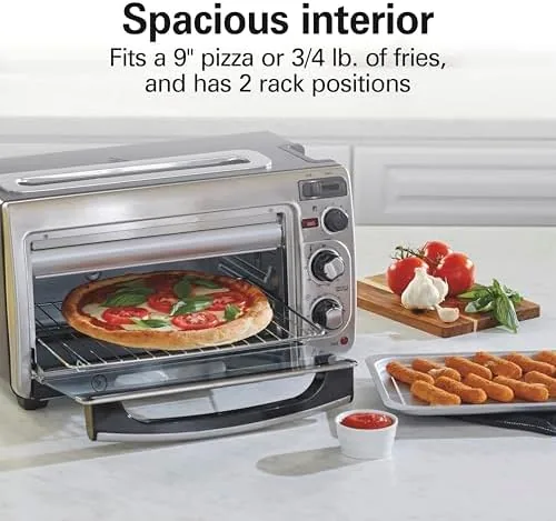 Toast in the long slot while a tray of food bakes inside the oven