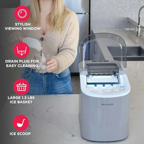 A fresh batch of bullet shaped ice dropping into the basket under the lid window