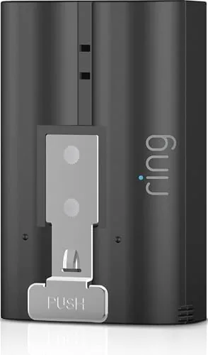 Quick Release battery pack held next to a Ring camera