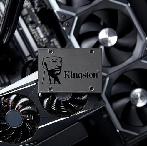 A transfer window showing files moving to the Kingston SSD during cloning