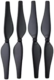 A broken propeller next to a fresh replacement blade from the set