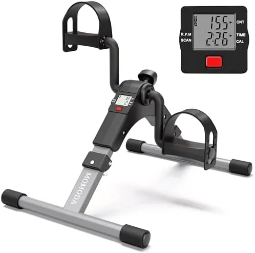 Pedal exerciser desk bike placed under a desk
