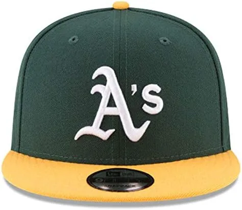 The Athletics snapback worn at a ballgame with a stadium in the background