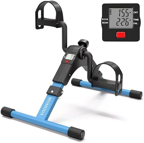 Pedal exerciser placed under a desk in a home office