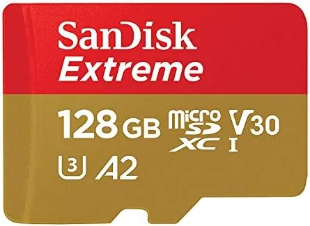 SanDisk Extreme 128GB card installed in an action camera being used outdoors
