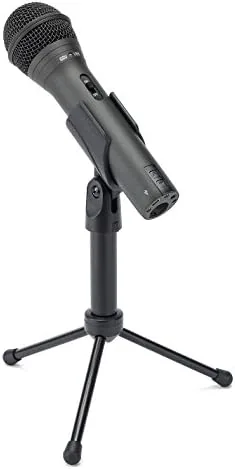 A podcaster recording a conversation at a desk with the Samson Q2U
