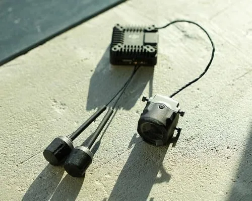Close up of the DJI O4 camera module and lens on an FPV build