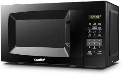 The COMFEE 0.7 cubic foot microwave sitting on a kitchen counter