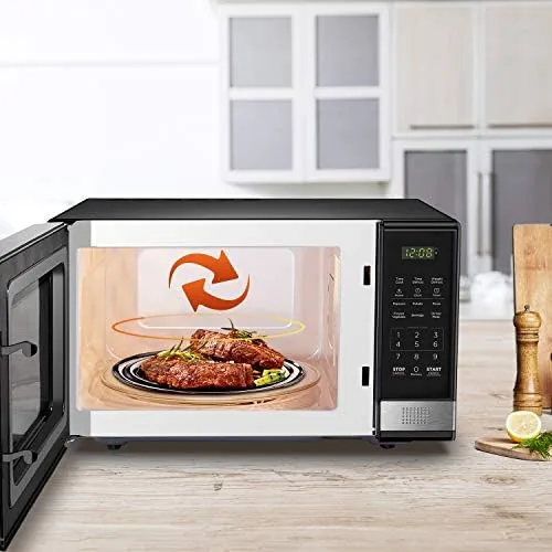 Family kitchen counter with the BLACK+DECKER microwave in daily use
