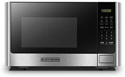 BLACK+DECKER 0.9 cu ft stainless steel microwave on a compact kitchen counter