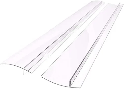 Silicone stove gap covers laid out next to a kitchen counter gap