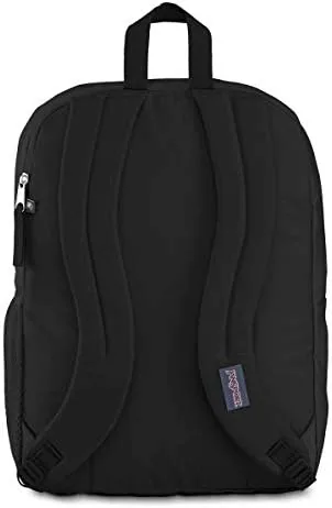 Student carrying the JanSport laptop backpack on a campus walk