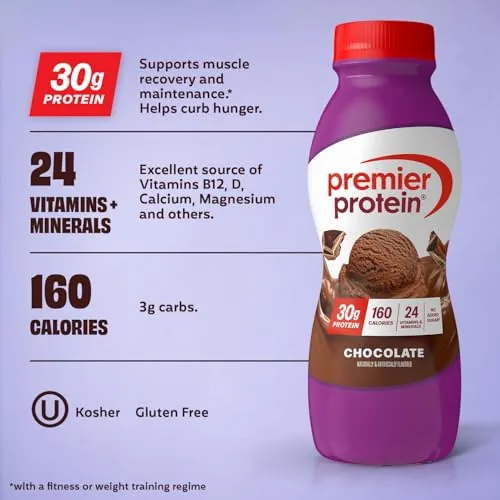 A glass of chocolate protein shake being poured from a bottle