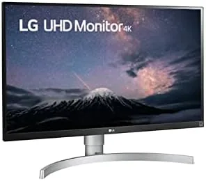 The LG monitor displaying a photo editing workspace with the image on screen