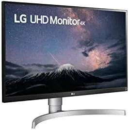The LG 27UL650-W beside a Dell and a newer LG monitor for comparison