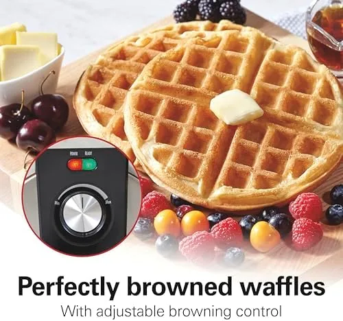 The waffle maker stored upright on a kitchen counter between uses
