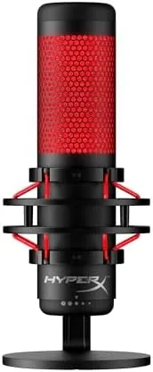The HyperX QuadCast microphone on its stand with the red LED ring glowing