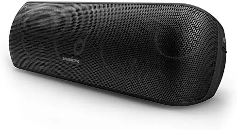 The Soundcore Motion+ speaker on a living room shelf