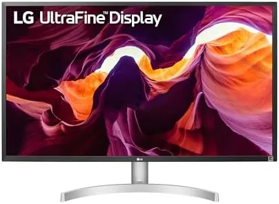 The LG 27UL500-W 4K monitor on a white desk setup