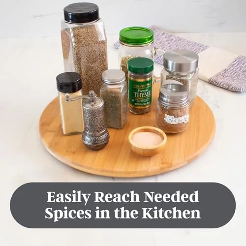 The lazy susan spinning in a kitchen cabinet with jars in reach