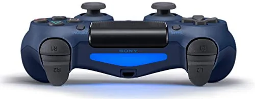Hands playing a racing game with the DualShock 4 connected wirelessly