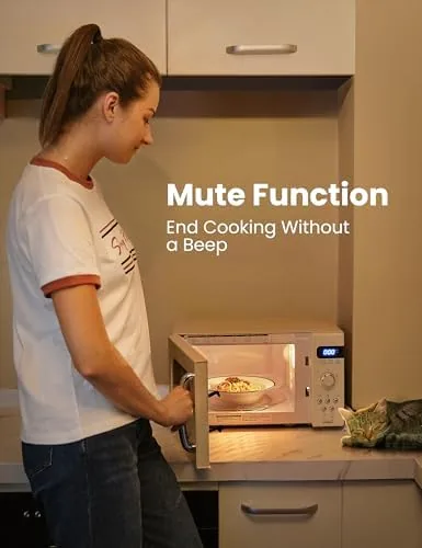 Reheated meal being lifted from the cream retro microwave