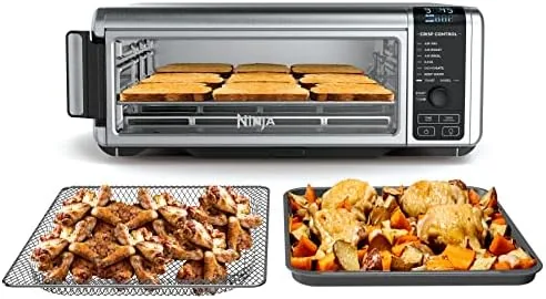 The Ninja SP101 countertop oven in its flipped down cooking position on a kitchen counter