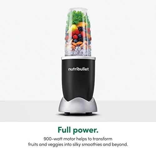 Frozen fruit and ice going into the 32 ounce nutribullet cup before blending