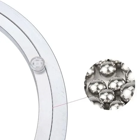 Bearing halves joined and rotating under a weighted table top