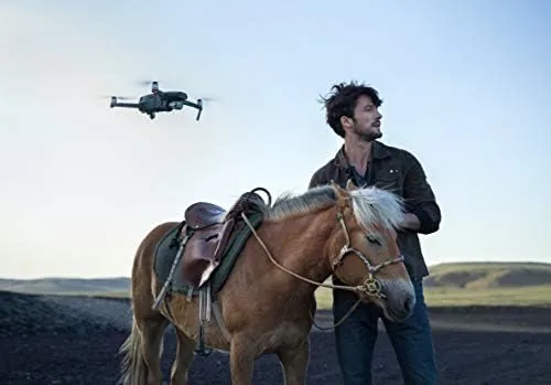 Photographer flying the Mavic 2 Pro over a shoreline