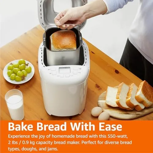 A breakfast spread with fresh sliced bread made in the bread maker