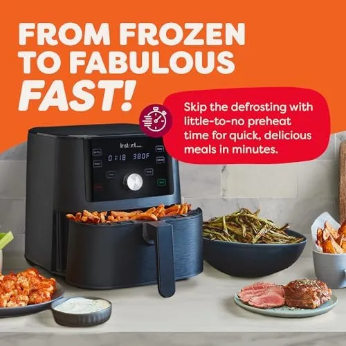 Golden frozen fries in the air fryer basket after cooking