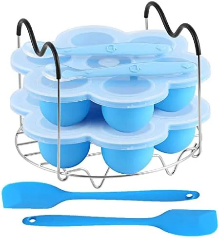 The full 7-piece silicone egg bites mold set laid out with the tray, rack, and utensils