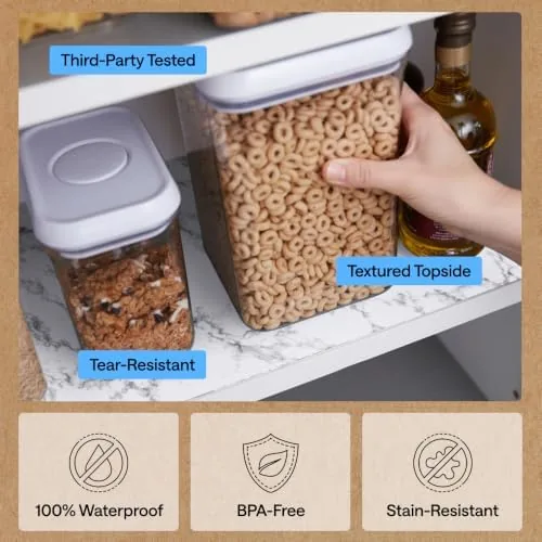 The marble liner in a bathroom cabinet shelf with bottles and supplies arranged