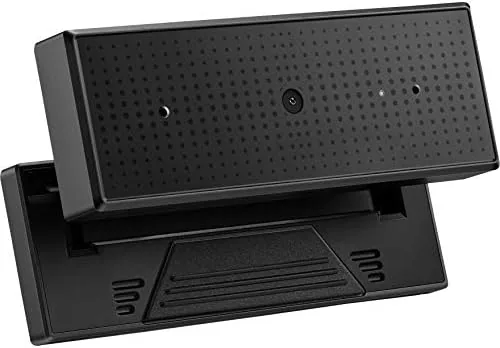 A desktop setup showing the ROG Eye mounted on a monitor next to other streaming gear