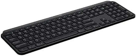 The MX Keys connected to a laptop and a desktop in a multi device setup