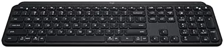 The MX Keys in a dark room showing the automatic backlight that wakes on approach