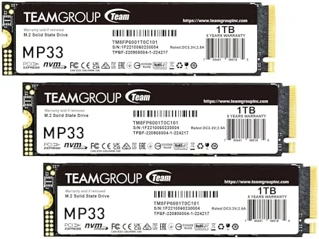 Laptop opened with the TEAMGROUP MP33 installed in the M.2 bay