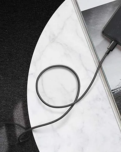 Anker cable coiled in a travel pouch with a USB C adapter