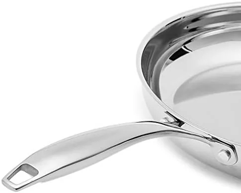 Close up of the stainless steel cooking surface and riveted handle