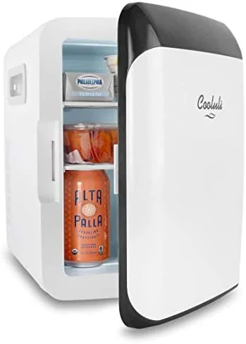 A row of beauty and makeup products inside the white Cooluli fridge
