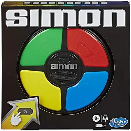 Hasbro Simon handheld memory game with colored light panels on a table