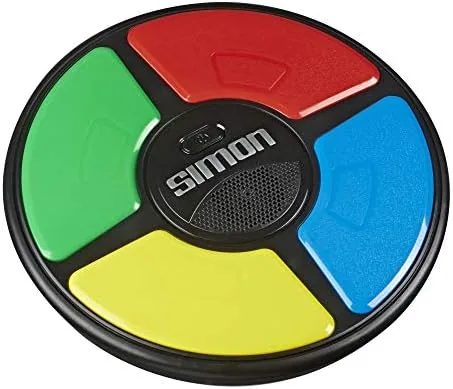 Close up of the four colored light panels and speaker on the Simon game