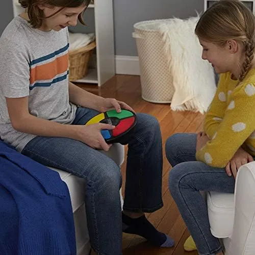 Simon game packed in a travel bag with other family essentials