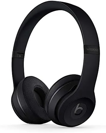 Beats Solo3 Wireless headphones in black resting on a table