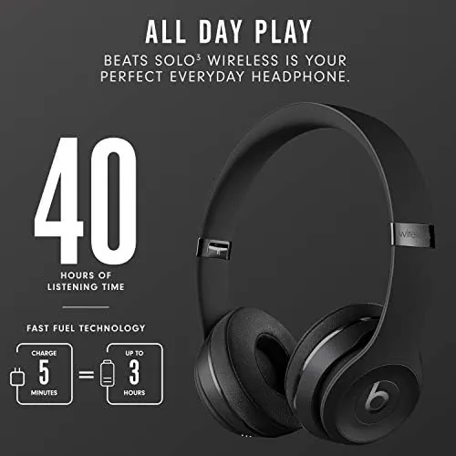 Person wearing the Beats Solo3 Wireless headphones while walking outdoors