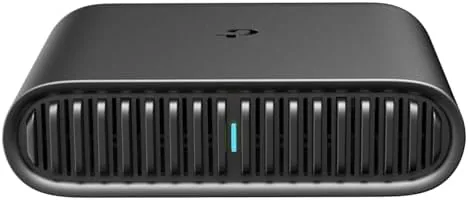 Network test setup with the Archer AX10, laptop, and diagnostic tools