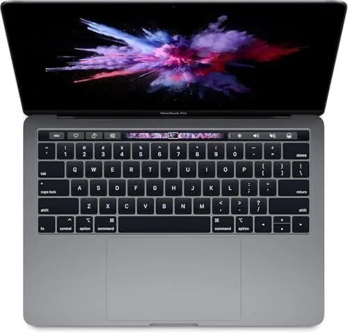 A student working with the renewed MacBook Pro 13 in a library